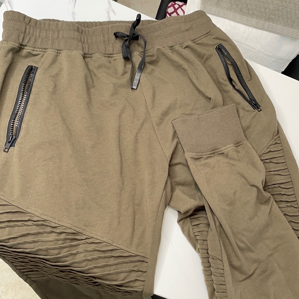 Green sweat pants